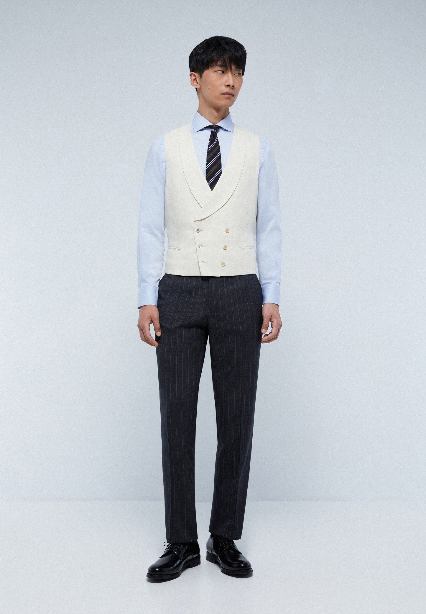 VESTE SANS MANCHES QUEUE DE PIE COL ROND