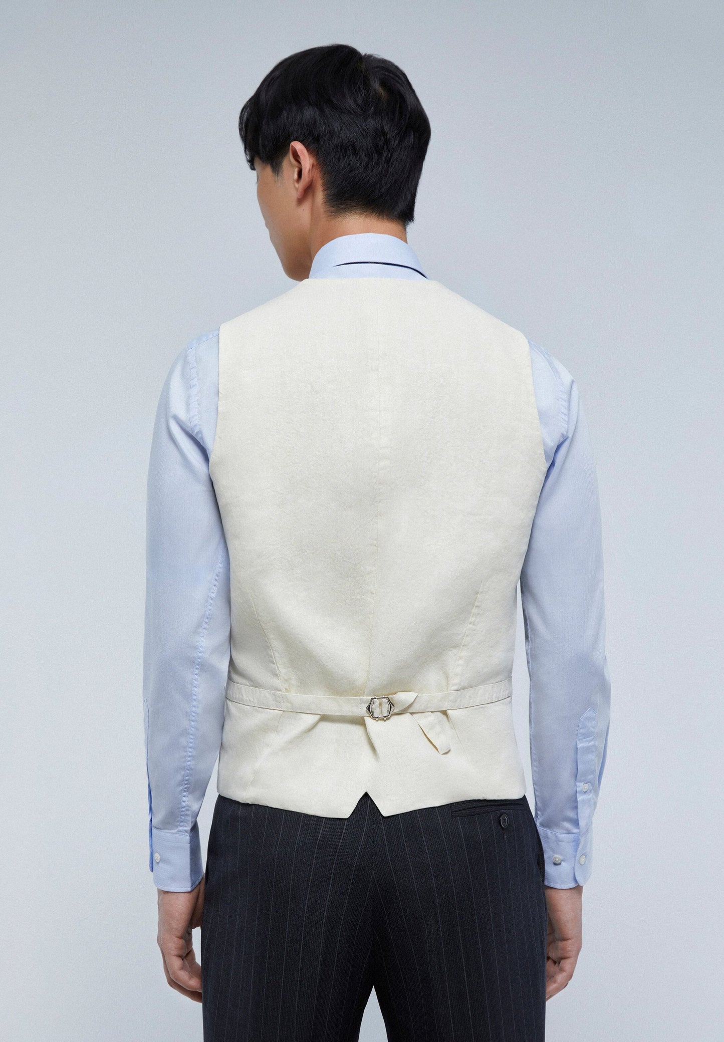 VESTE SANS MANCHES QUEUE DE PIE COL ROND